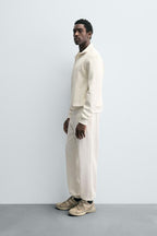 BASIC QUARTER-ZIP SWEATSHIRT