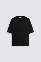 Black t-shirt on a light gray background